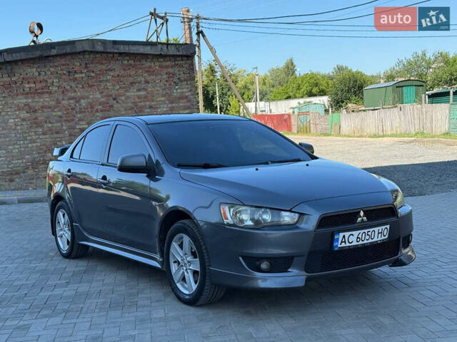 Сірий Міцубісі Lancer, об'ємом двигуна 2 л та пробігом 298 тис. км за 5600 $, фото 1 на Automoto.ua