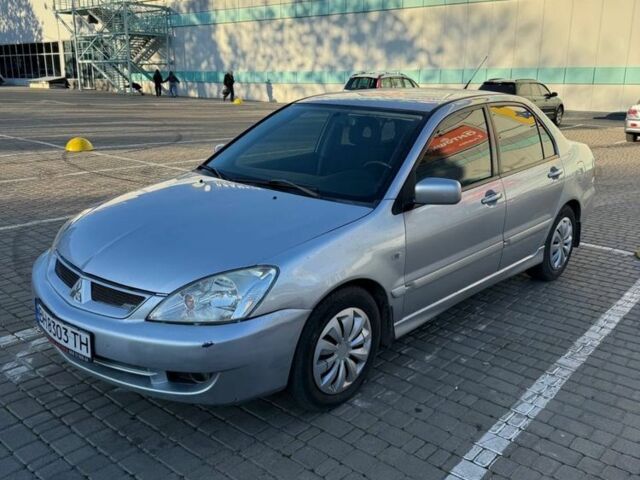 Сірий Міцубісі Lancer, об'ємом двигуна 1.6 л та пробігом 174 тис. км за 4800 $, фото 1 на Automoto.ua
