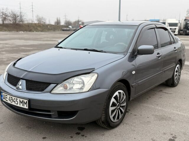 Сірий Міцубісі Lancer, об'ємом двигуна 1.6 л та пробігом 270 тис. км за 4300 $, фото 1 на Automoto.ua