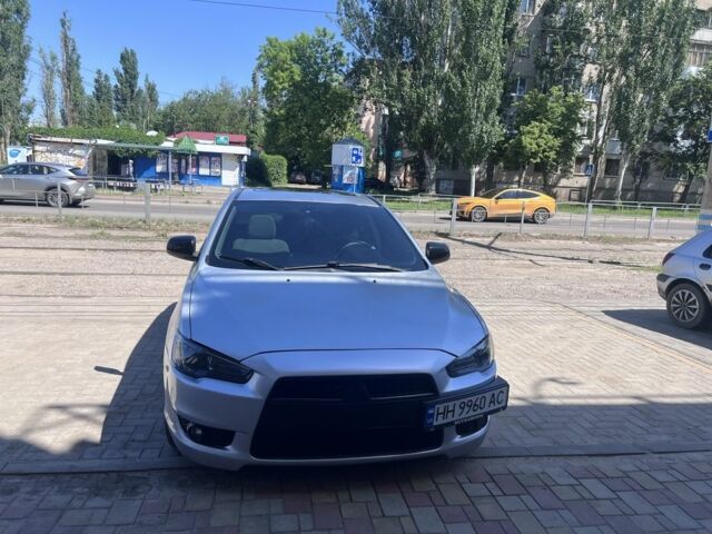 Серый Мицубиси Лансер, объемом двигателя 2 л и пробегом 288 тыс. км за 6000 $, фото 1 на Automoto.ua