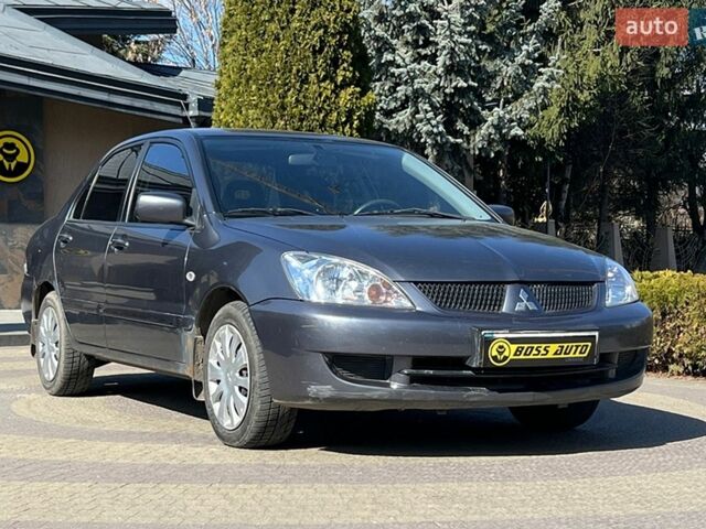 Сірий Міцубісі Lancer, об'ємом двигуна 1.6 л та пробігом 139 тис. км за 3200 $, фото 1 на Automoto.ua