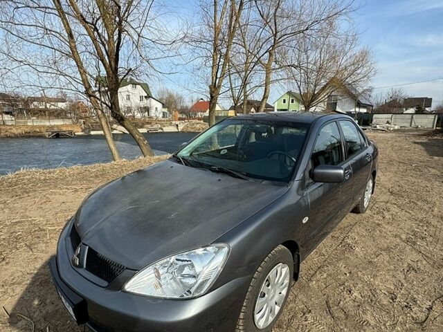 Сірий Міцубісі Lancer, об'ємом двигуна 1.6 л та пробігом 135 тис. км за 4500 $, фото 1 на Automoto.ua