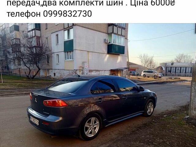 Серый Мицубиси Лансер, объемом двигателя 2 л и пробегом 252 тыс. км за 6000 $, фото 1 на Automoto.ua