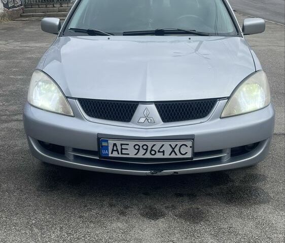 Сірий Міцубісі Lancer, об'ємом двигуна 1.6 л та пробігом 200 тис. км за 4200 $, фото 1 на Automoto.ua