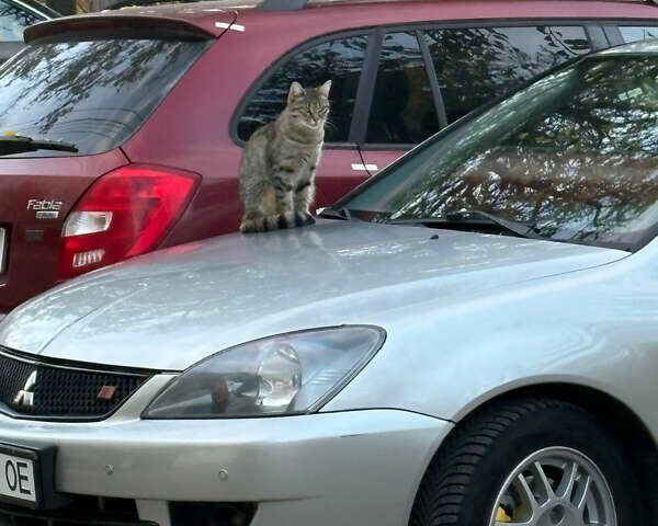 Сірий Міцубісі Lancer, об'ємом двигуна 2 л та пробігом 180 тис. км за 4000 $, фото 1 на Automoto.ua