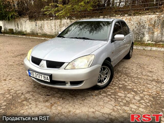 Серый Мицубиси Лансер, объемом двигателя 1.6 л и пробегом 380 тыс. км за 4000 $, фото 1 на Automoto.ua