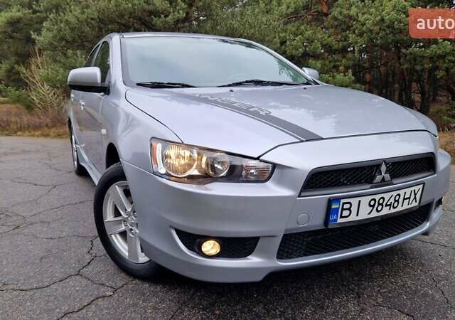 Серый Мицубиси Лансер, объемом двигателя 2 л и пробегом 213 тыс. км за 6550 $, фото 1 на Automoto.ua