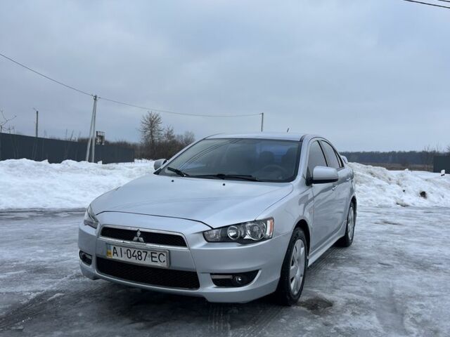 Серый Мицубиси Лансер, объемом двигателя 1.5 л и пробегом 250 тыс. км за 4600 $, фото 1 на Automoto.ua
