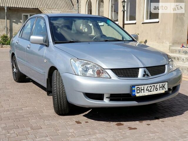 Сірий Міцубісі Lancer, об'ємом двигуна 1.6 л та пробігом 180 тис. км за 6000 $, фото 1 на Automoto.ua