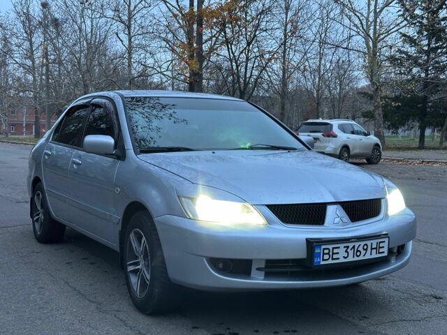 Сірий Міцубісі Lancer, об'ємом двигуна 1.6 л та пробігом 210 тис. км за 4750 $, фото 1 на Automoto.ua