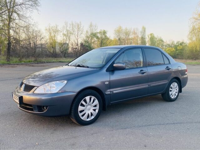 Сірий Міцубісі Lancer, об'ємом двигуна 0.16 л та пробігом 97 тис. км за 5200 $, фото 1 на Automoto.ua