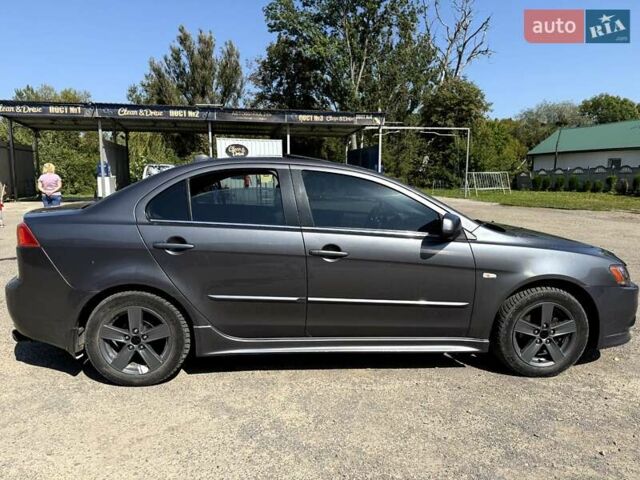 Сірий Міцубісі Lancer, об'ємом двигуна 2 л та пробігом 203 тис. км за 6200 $, фото 1 на Automoto.ua