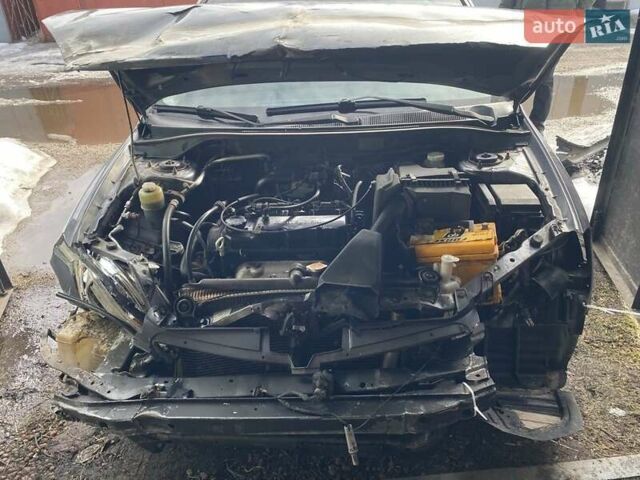 Серый Мицубиси Лансер, объемом двигателя 1.6 л и пробегом 191 тыс. км за 2000 $, фото 1 на Automoto.ua