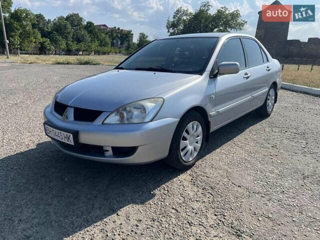 Сірий Міцубісі Lancer, об'ємом двигуна 1.6 л та пробігом 283 тис. км за 4900 $, фото 1 на Automoto.ua
