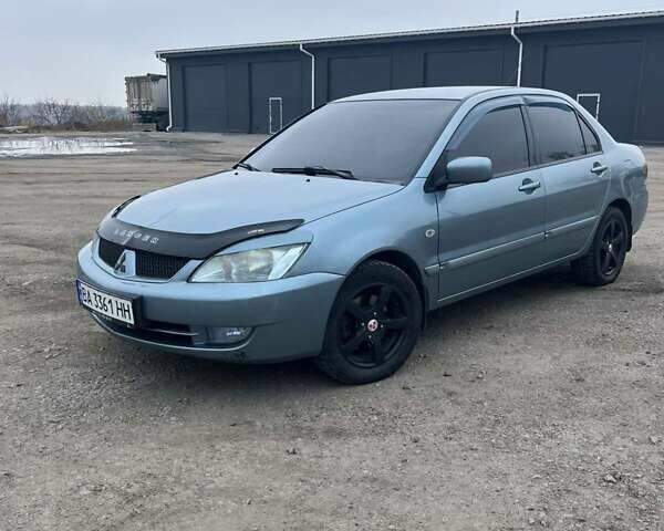 Сірий Міцубісі Lancer, об'ємом двигуна 1.58 л та пробігом 341 тис. км за 4500 $, фото 1 на Automoto.ua