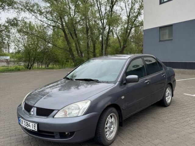 Сірий Міцубісі Lancer, об'ємом двигуна 1.6 л та пробігом 190 тис. км за 3800 $, фото 1 на Automoto.ua