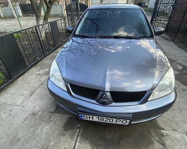 Сірий Міцубісі Lancer, об'ємом двигуна 1.6 л та пробігом 150 тис. км за 4100 $, фото 1 на Automoto.ua