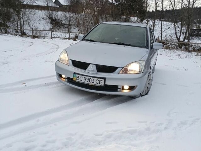 Серый Мицубиси Лансер, объемом двигателя 1.6 л и пробегом 230 тыс. км за 3400 $, фото 1 на Automoto.ua