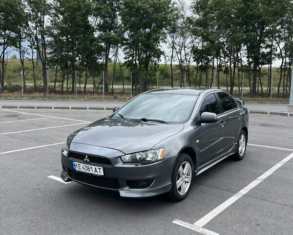 Сірий Міцубісі Lancer, об'ємом двигуна 2 л та пробігом 300 тис. км за 6299 $, фото 1 на Automoto.ua