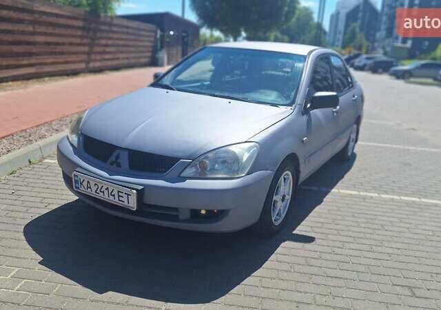 Серый Мицубиси Лансер, объемом двигателя 1.6 л и пробегом 260 тыс. км за 4100 $, фото 1 на Automoto.ua