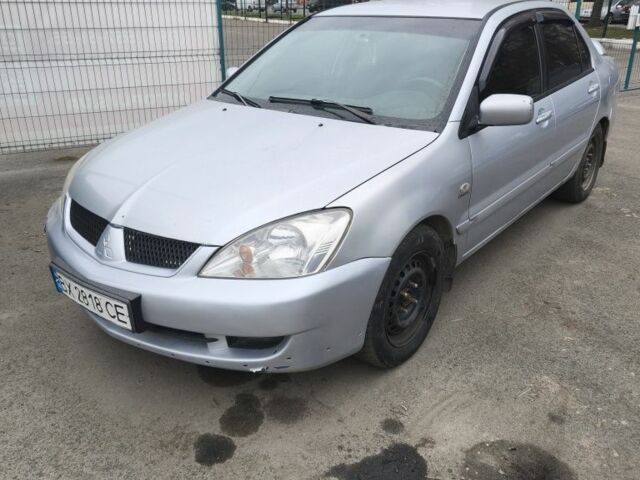 Сірий Міцубісі Lancer, об'ємом двигуна 1.6 л та пробігом 400 тис. км за 2500 $, фото 1 на Automoto.ua