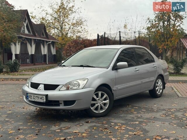 Сірий Міцубісі Lancer, об'ємом двигуна 1.6 л та пробігом 185 тис. км за 4499 $, фото 1 на Automoto.ua