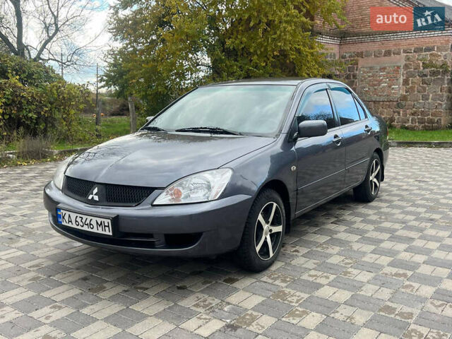 Міцубісі Lancer 2007 у Белой Церкве на Automoto.ua Сірий Міцубісі Lancer, об'ємом двигуна 1.58 л та пробігом 254 тис. км за 3200 $, фото 1 на Automoto.ua