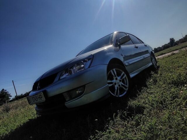 Сірий Міцубісі Lancer, об'ємом двигуна 1.58 л та пробігом 240 тис. км за 3200 $, фото 1 на Automoto.ua