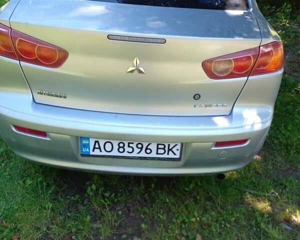 Серый Мицубиси Лансер, объемом двигателя 2 л и пробегом 160 тыс. км за 5300 $, фото 1 на Automoto.ua