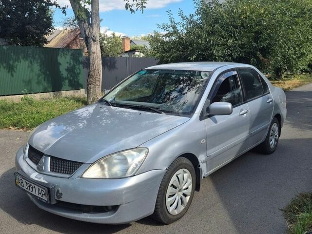 Сірий Міцубісі Lancer, об'ємом двигуна 1.6 л та пробігом 237 тис. км за 2500 $, фото 1 на Automoto.ua