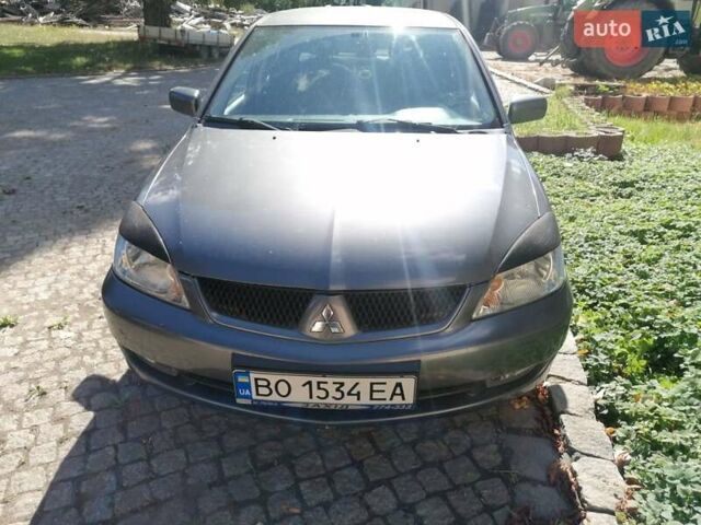 Сірий Міцубісі Lancer, об'ємом двигуна 1.6 л та пробігом 205 тис. км за 3800 $, фото 1 на Automoto.ua