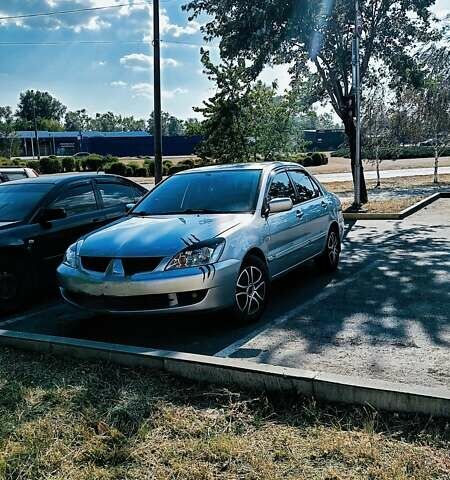 Сірий Міцубісі Lancer, об'ємом двигуна 1.6 л та пробігом 213 тис. км за 3800 $, фото 1 на Automoto.ua
