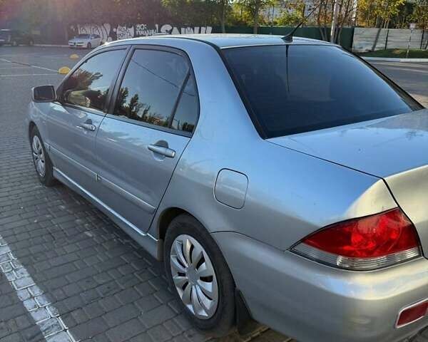 Сірий Міцубісі Lancer, об'ємом двигуна 1.6 л та пробігом 174 тис. км за 4800 $, фото 1 на Automoto.ua