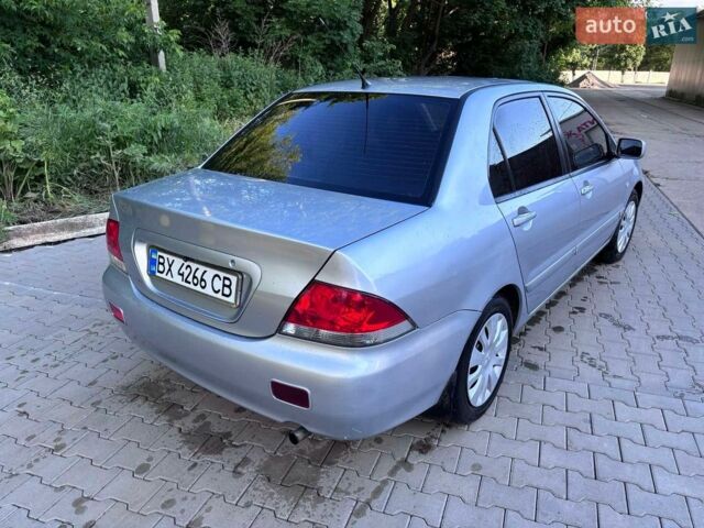 Сірий Міцубісі Lancer, об'ємом двигуна 1.6 л та пробігом 258 тис. км за 3350 $, фото 1 на Automoto.ua