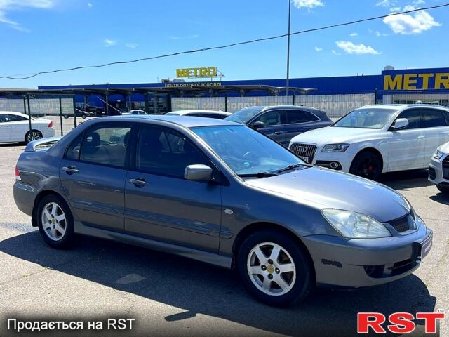 Сірий Міцубісі Lancer, об'ємом двигуна 1.6 л та пробігом 130 тис. км за 3999 $, фото 1 на Automoto.ua