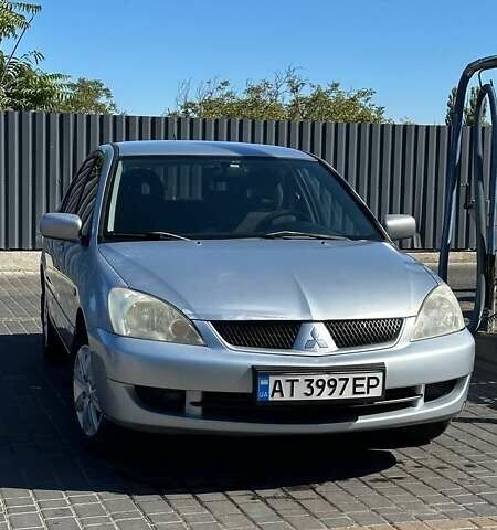 Сірий Міцубісі Lancer, об'ємом двигуна 1.6 л та пробігом 460 тис. км за 3350 $, фото 1 на Automoto.ua