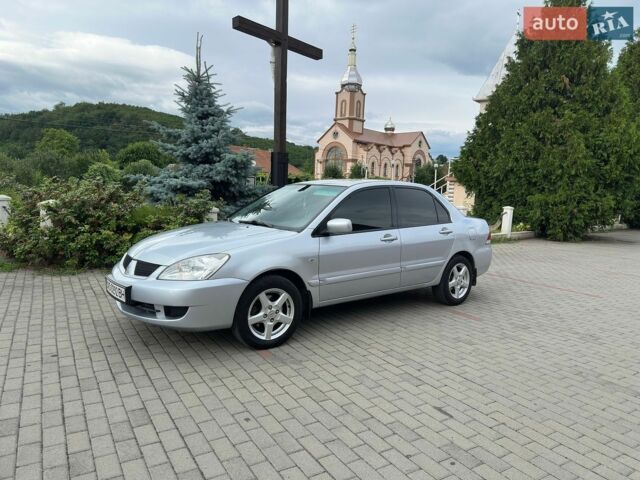Сірий Міцубісі Lancer, об'ємом двигуна 1.59 л та пробігом 205 тис. км за 4350 $, фото 1 на Automoto.ua