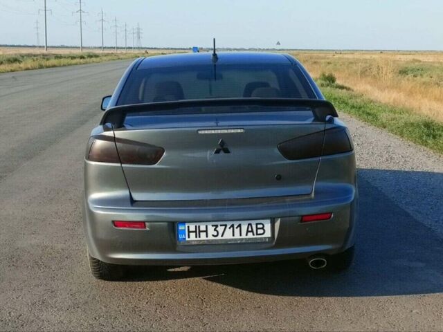 Сірий Міцубісі Lancer, об'ємом двигуна 2 л та пробігом 240 тис. км за 5000 $, фото 1 на Automoto.ua