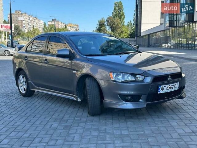 Сірий Міцубісі Lancer, об'ємом двигуна 2 л та пробігом 242 тис. км за 6300 $, фото 1 на Automoto.ua