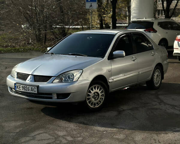 Сірий Міцубісі Lancer, об'ємом двигуна 1.6 л та пробігом 249 тис. км за 5100 $, фото 1 на Automoto.ua