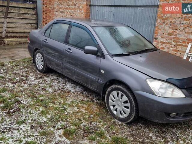 Сірий Міцубісі Lancer, об'ємом двигуна 1.6 л та пробігом 162 тис. км за 3500 $, фото 1 на Automoto.ua