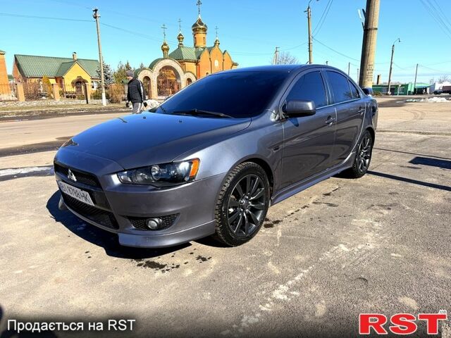 Серый Мицубиси Лансер, объемом двигателя 2 л и пробегом 240 тыс. км за 7700 $, фото 1 на Automoto.ua