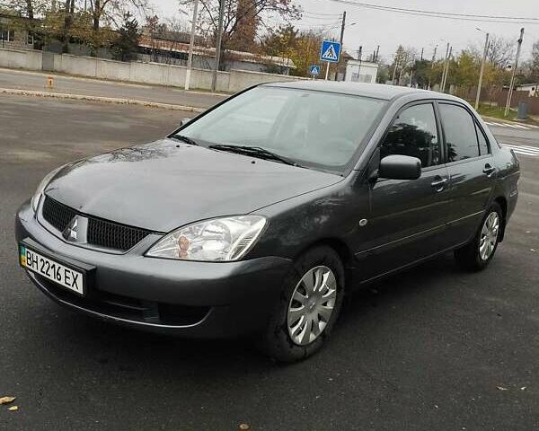 Серый Мицубиси Лансер, объемом двигателя 1.6 л и пробегом 181 тыс. км за 4500 $, фото 1 на Automoto.ua