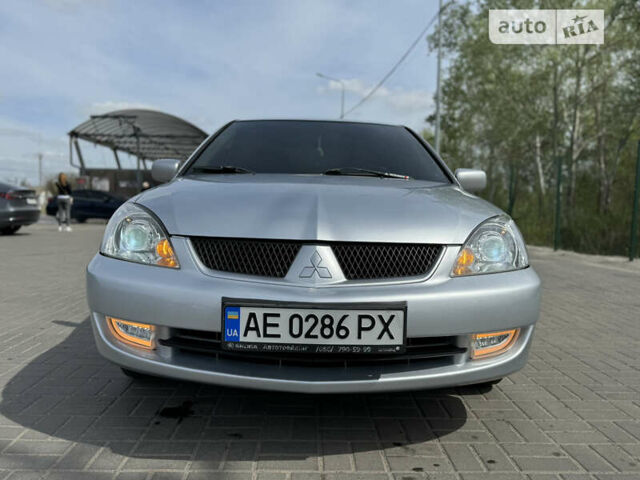 Сірий Міцубісі Lancer, об'ємом двигуна 1.58 л та пробігом 240 тис. км за 5500 $, фото 1 на Automoto.ua