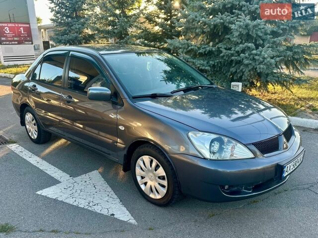Сірий Міцубісі Lancer, об'ємом двигуна 1.6 л та пробігом 176 тис. км за 3650 $, фото 1 на Automoto.ua