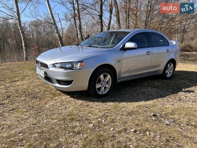 Серый Мицубиси Лансер, объемом двигателя 1.5 л и пробегом 263 тыс. км за 5950 $, фото 1 на Automoto.ua