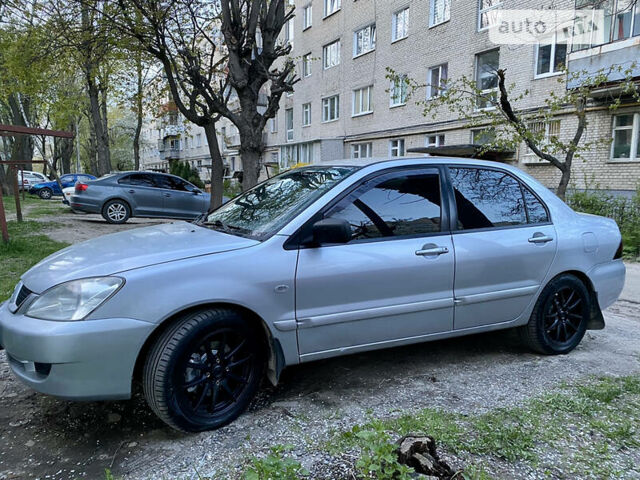 Сірий Міцубісі Lancer, об'ємом двигуна 1.6 л та пробігом 360 тис. км за 3000 $, фото 1 на Automoto.ua