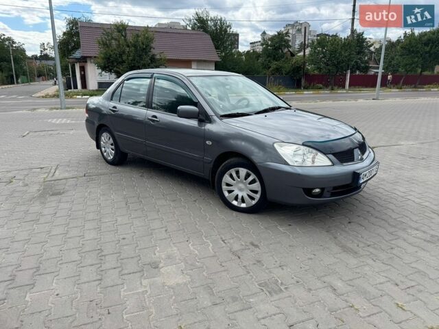 Сірий Міцубісі Lancer, об'ємом двигуна 1.6 л та пробігом 167 тис. км за 3650 $, фото 1 на Automoto.ua
