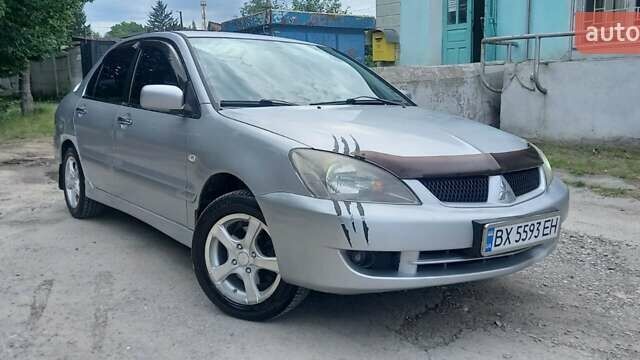 Сірий Міцубісі Lancer, об'ємом двигуна 1.6 л та пробігом 298 тис. км за 4100 $, фото 1 на Automoto.ua