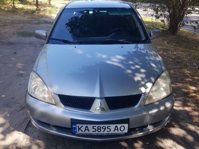 Сірий Міцубісі Lancer, об'ємом двигуна 1.6 л та пробігом 236 тис. км за 4500 $, фото 1 на Automoto.ua